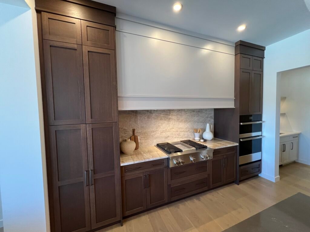 "Luxury high-end kitchen with premium finishes and quartz countertop – custom design by Coldii Inc. in Calgary